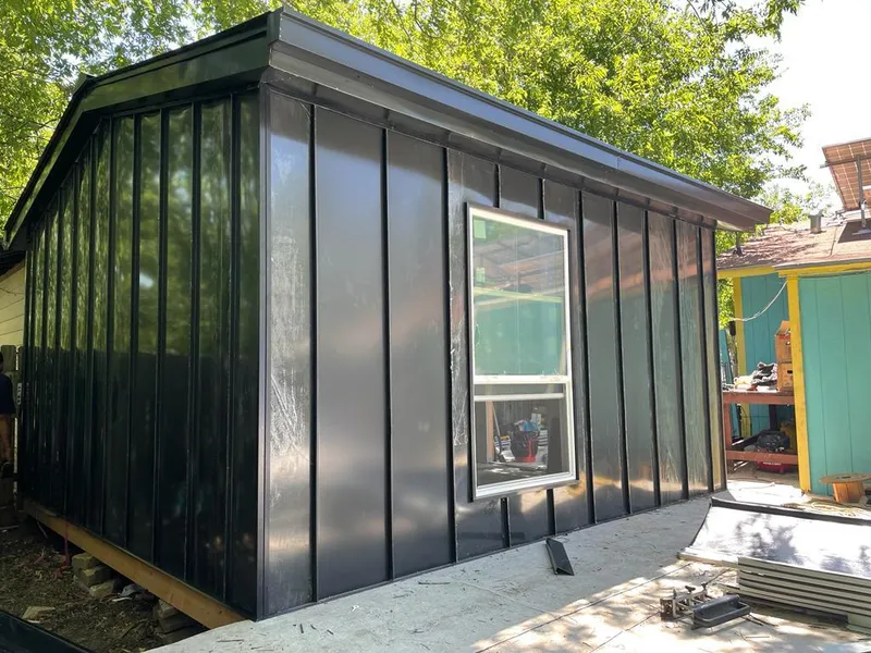 Black standing seam metal wall panels for Roof Inspection in Dunn Loring
