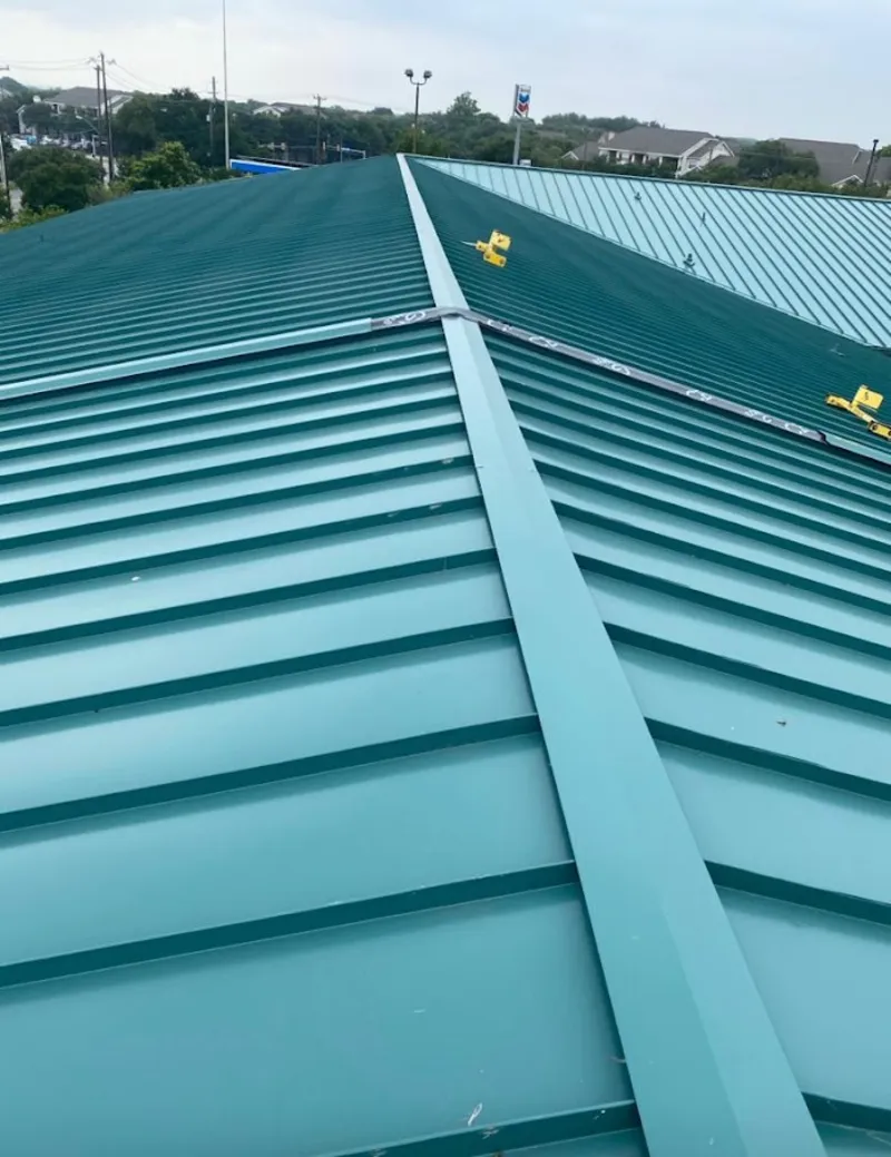 Green commercial metal roof ridge and valley for Metal Roof Repair in Dunn Loring